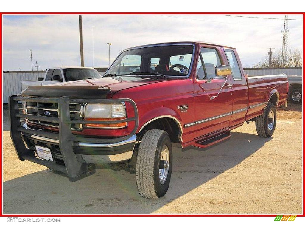 1997 F250 XLT Extended Cab 4x4 - Toreador Red Metallic / Ruby Red photo #1