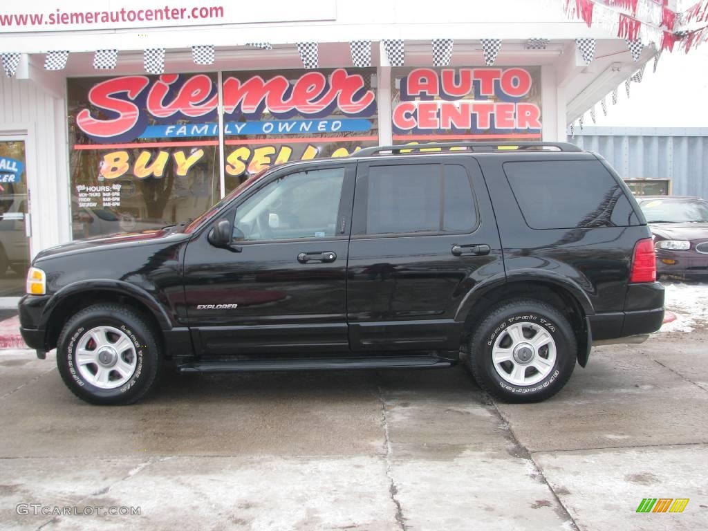 2002 Explorer Limited 4x4 - Black Clearcoat / Medium Parchment photo #1