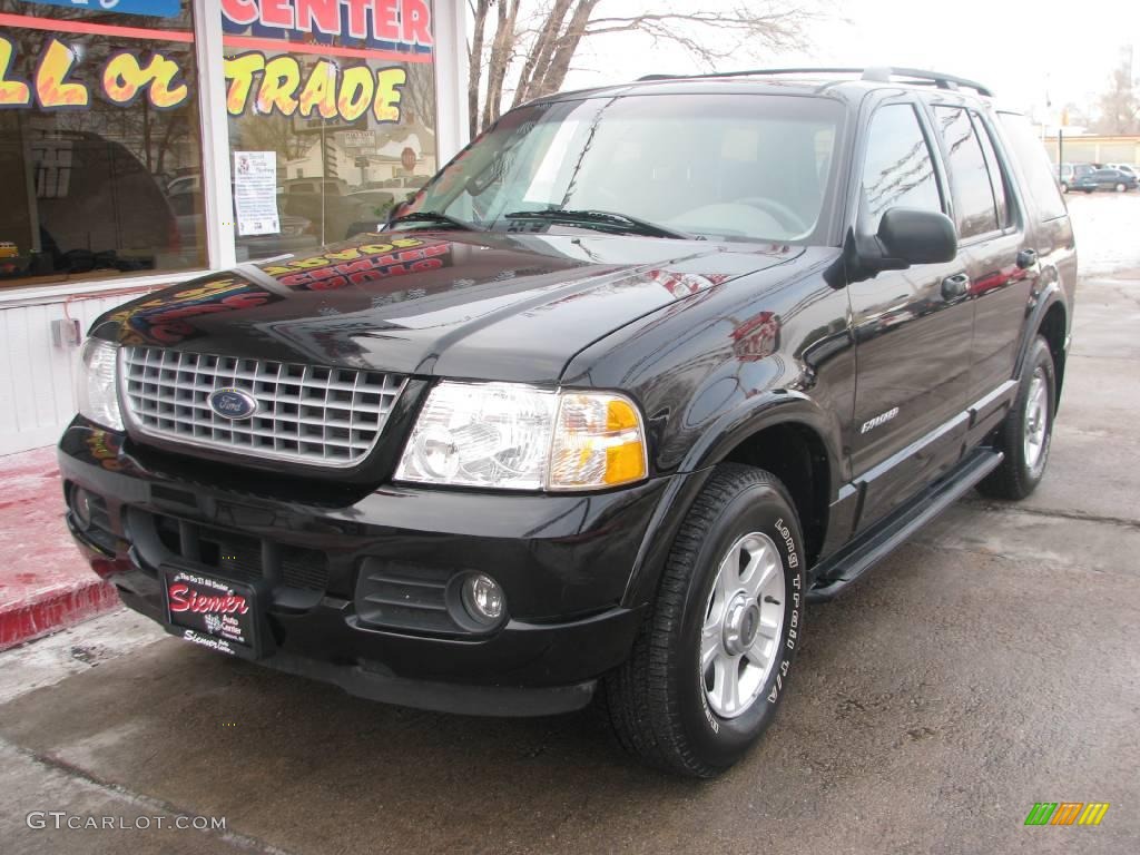 2002 Explorer Limited 4x4 - Black Clearcoat / Medium Parchment photo #5