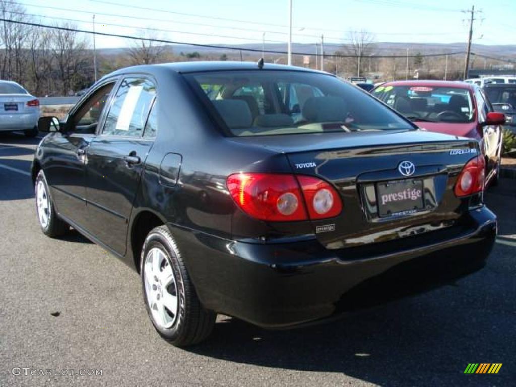 2006 Corolla LE - Black Sand Pearl / Beige photo #4