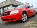 2009 Tor Red Dodge Avenger SE  photo #1