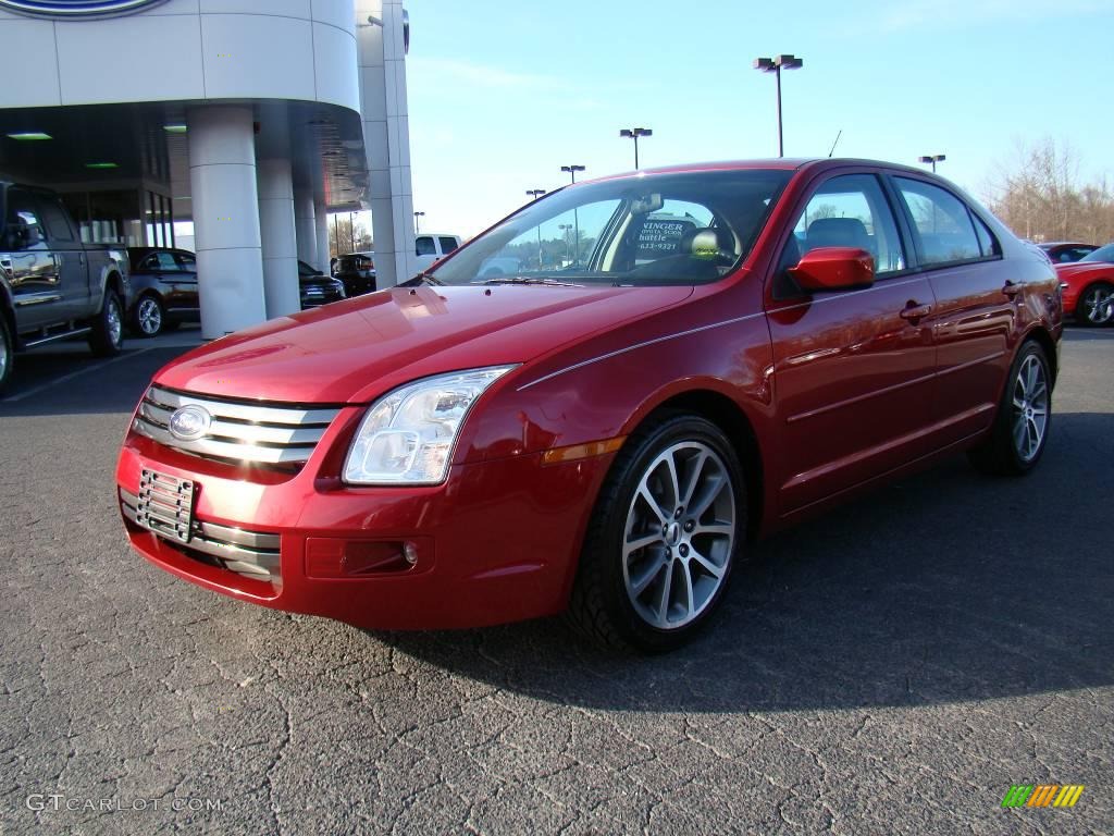 2008 Fusion SE - Redfire Metallic / Charcoal Black photo #6