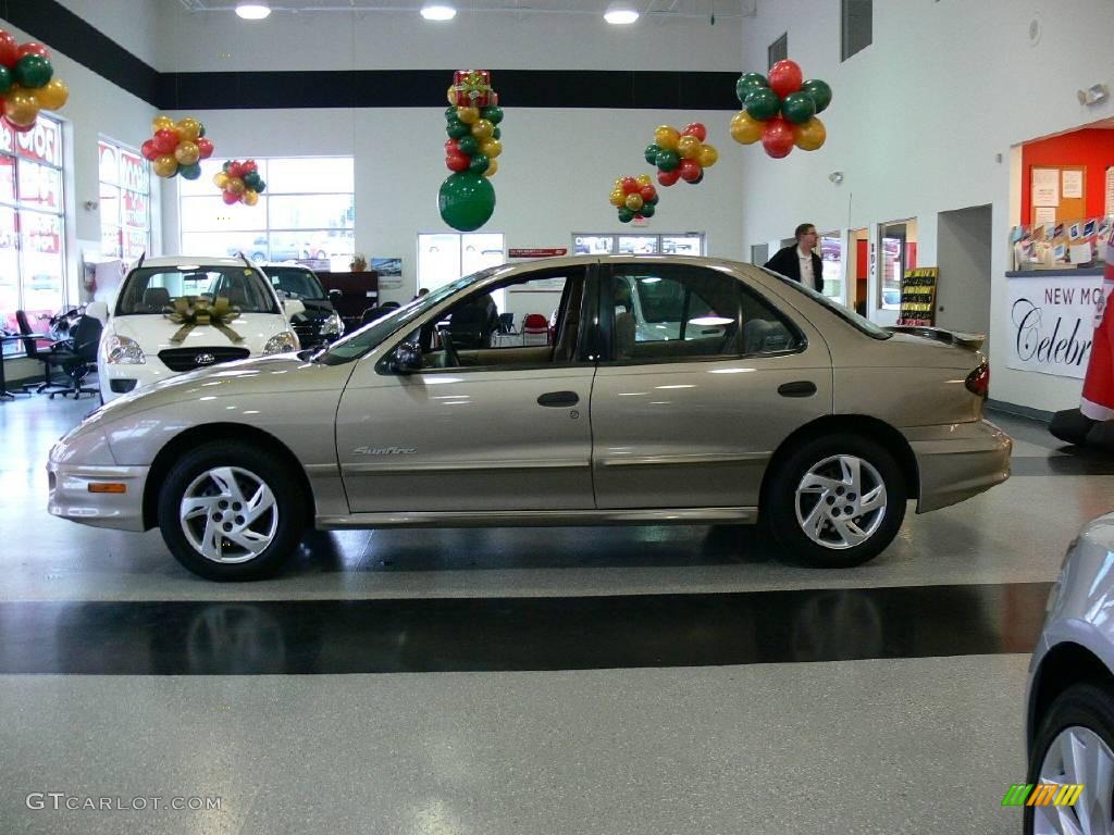 Light Taupe Metallic 2002 Pontiac Sunfire SE Sedan Exterior Photo #23670988