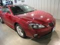 2006 Sport Red Metallic Pontiac Grand Prix GT Sedan  photo #1