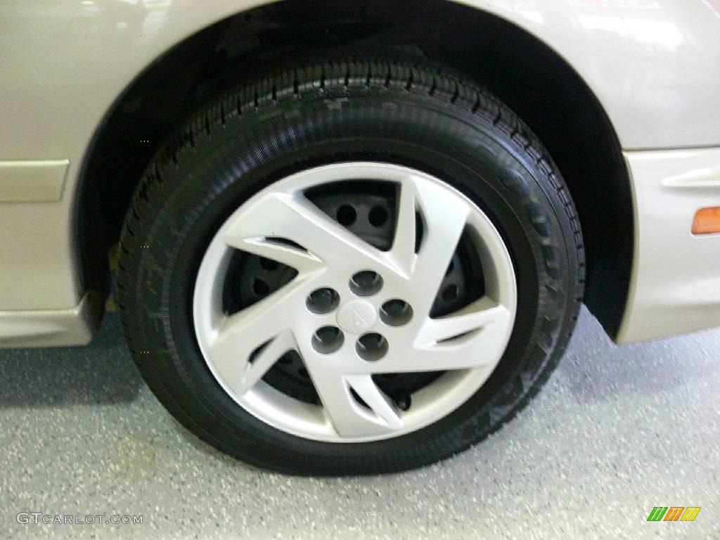 2002 Pontiac Sunfire SE Sedan Wheel Photo #23671236