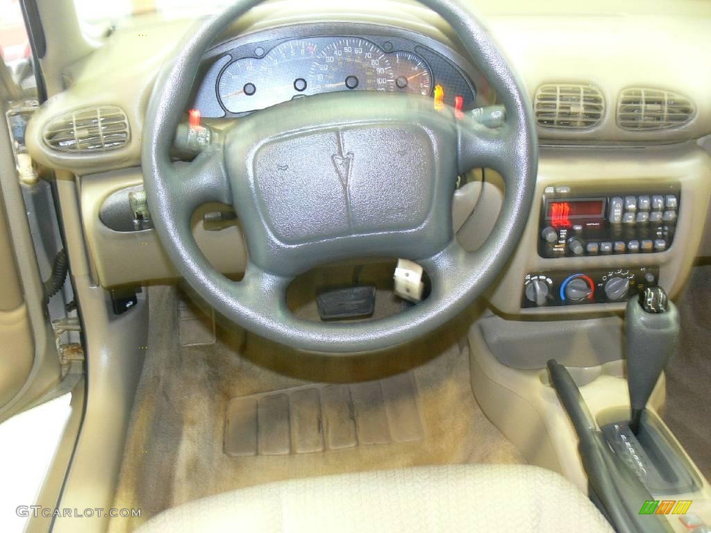 2002 Pontiac Sunfire SE Sedan Taupe Steering Wheel Photo #23671420