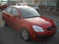 2009 Tropical Red Kia Rio LX Sedan  photo #1