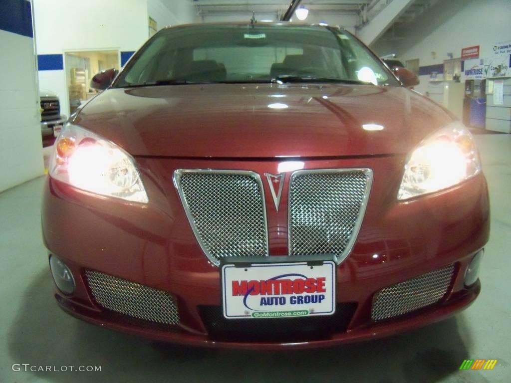 2009 G6 GXP Sedan - Performance Red Metallic / Ebony photo #1