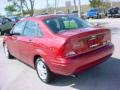 2002 Sangria Red Metallic Ford Focus SE Sedan  photo #5