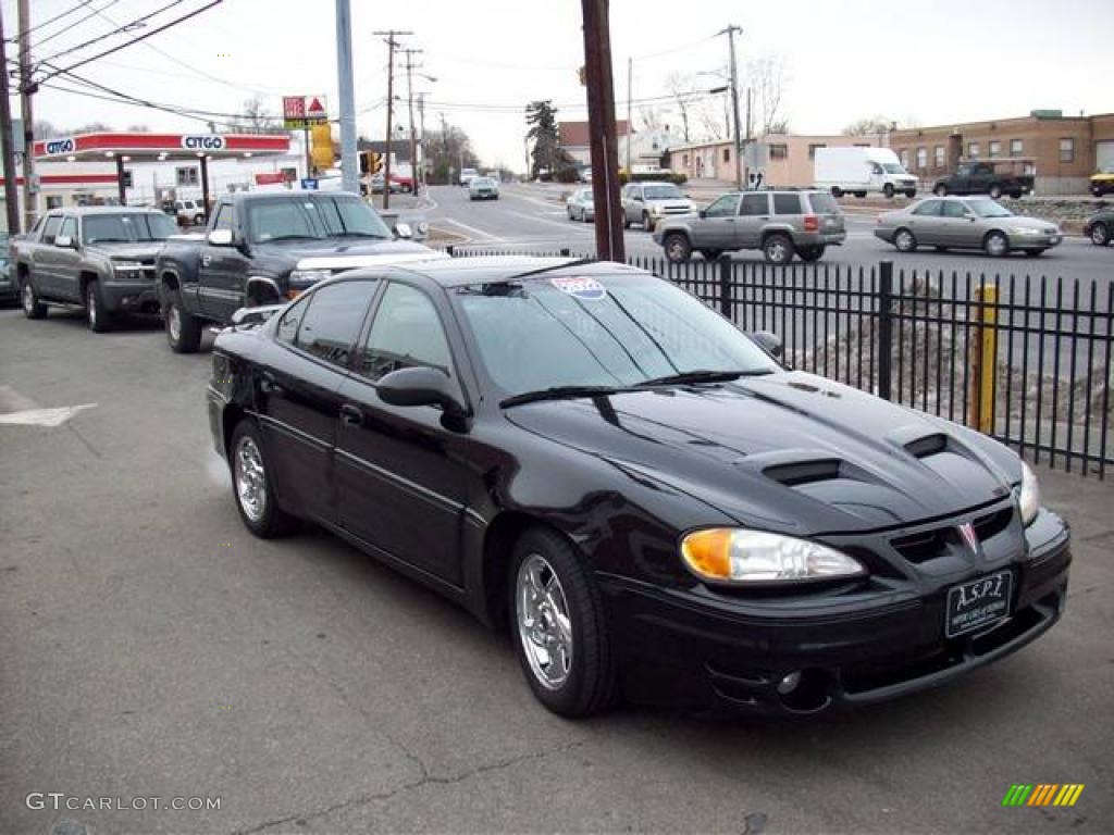 2002 Grand Am GT Sedan - Black / Dark Pewter photo #1