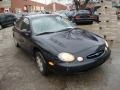 1998 Black Ford Taurus SE  photo #1