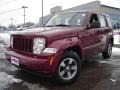 2009 Red Rock Crystal Pearl Jeep Liberty Sport  photo #1