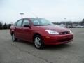 2002 Sangria Red Metallic Ford Focus SE Sedan  photo #4