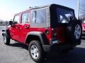 2010 Flame Red Jeep Wrangler Unlimited Sport 4x4  photo #2