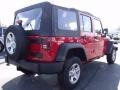 2010 Flame Red Jeep Wrangler Unlimited Sport 4x4  photo #3