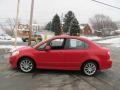 2009 Vivid Red Suzuki SX4 Technology Sport Sedan  photo #5