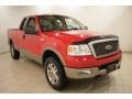 2005 Bright Red Ford F150 Lariat SuperCab 4x4  photo #1