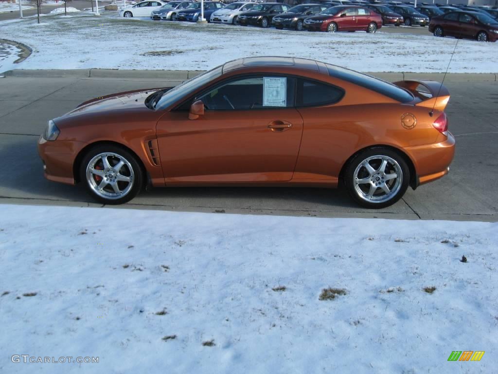 2006 Tiburon SE - Orange Crush / Black photo #7