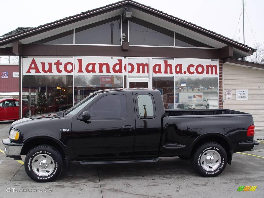 1997 F150 XLT Extended Cab 4x4 - Black / Medium Graphite photo #1