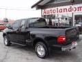 1997 Black Ford F150 XLT Extended Cab 4x4  photo #4