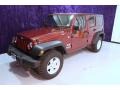 2009 Red Rock Crystal Pearl Jeep Wrangler Unlimited X 4x4  photo #22