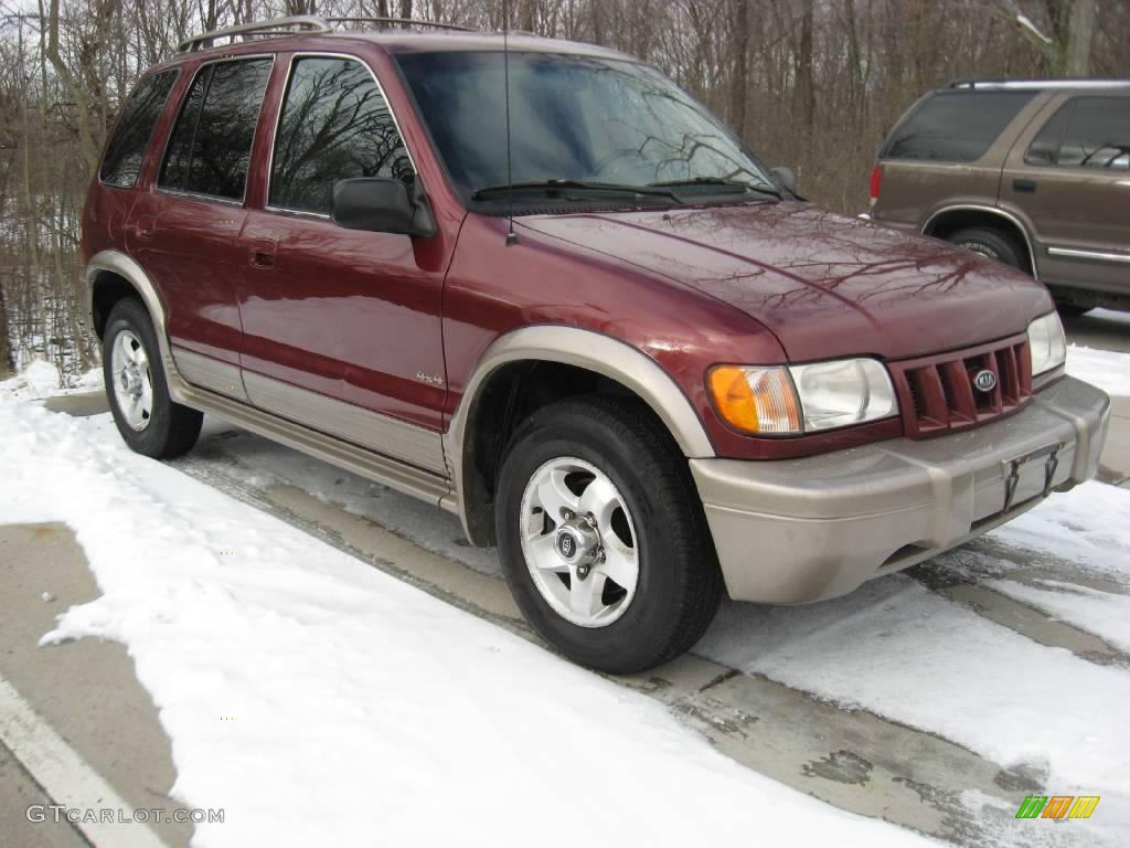 2002 Sportage 4x4 - Pepper Red / Brown photo #1