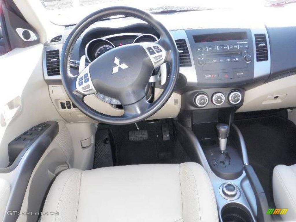 2007 Outlander XLS 4WD - Deep Blue Metallic / Beige photo #12