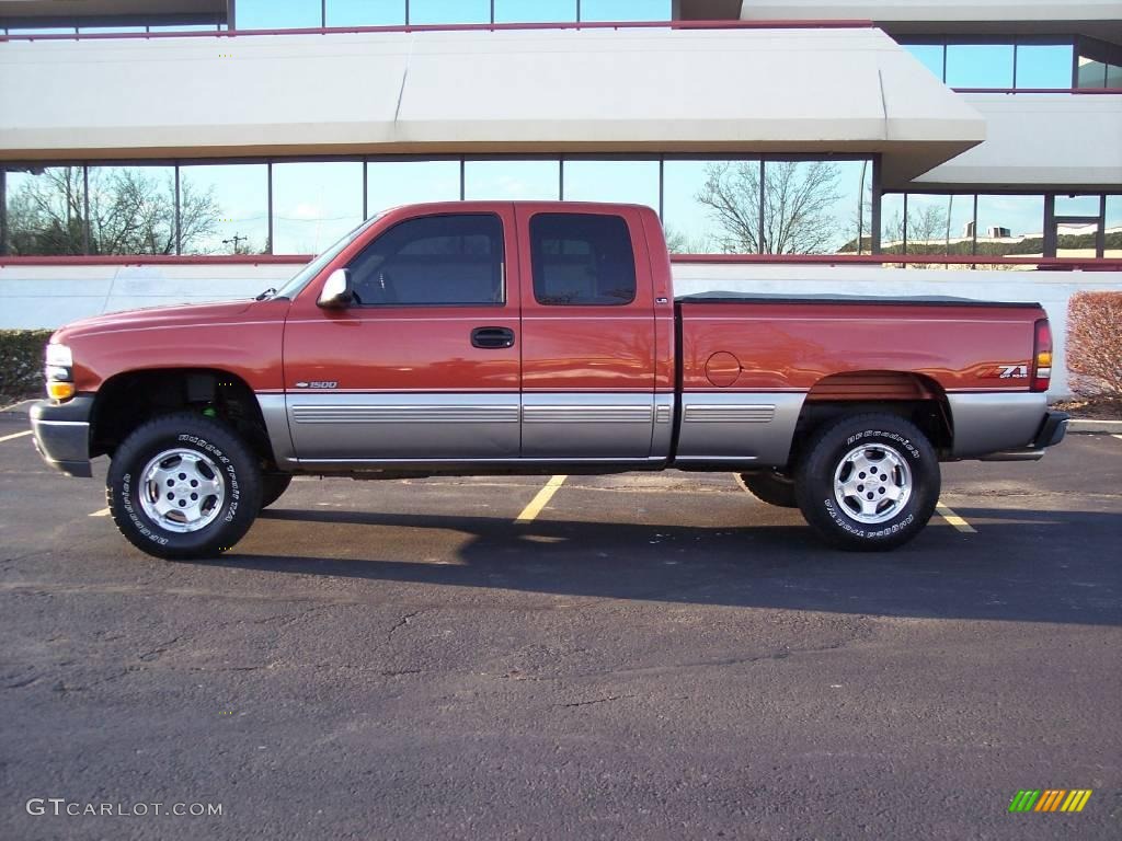 2001 Silverado 1500 LS Extended Cab 4x4 - Sunset Orange Metallic / Graphite photo #5