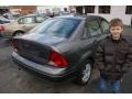 2002 Liquid Grey Metallic Ford Focus SE Sedan  photo #4