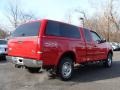 2000 Bright Red Ford F150 XLT Extended Cab 4x4  photo #5