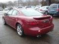 2006 Sport Red Metallic Pontiac Grand Prix GXP Sedan  photo #2