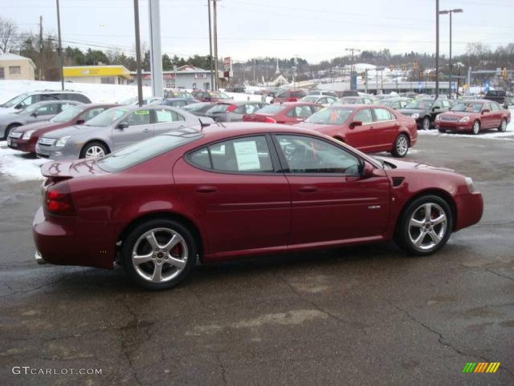 2006 Grand Prix GXP Sedan - Sport Red Metallic / Sand photo #5