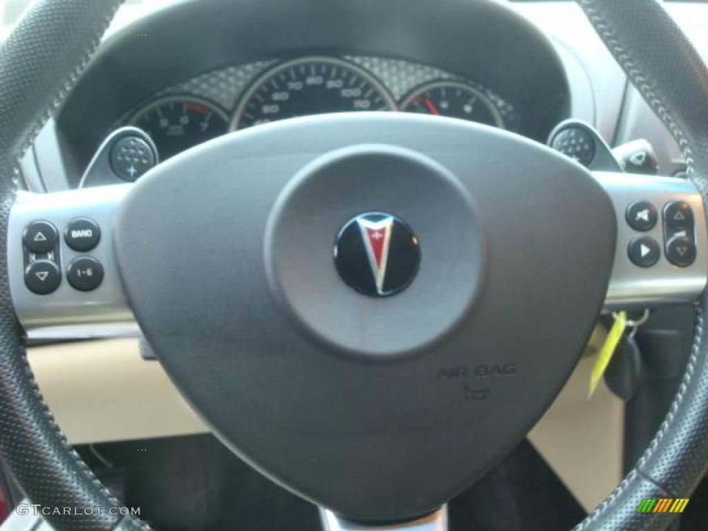 2006 Grand Prix GXP Sedan - Sport Red Metallic / Sand photo #16
