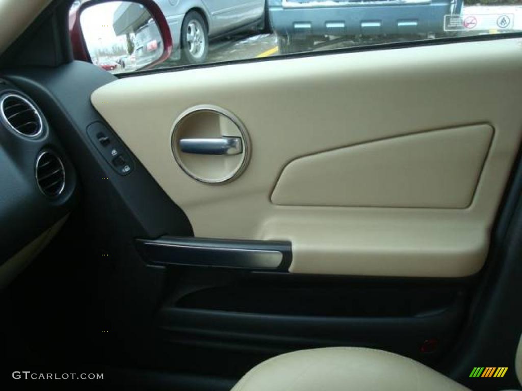 2006 Grand Prix GXP Sedan - Sport Red Metallic / Sand photo #17