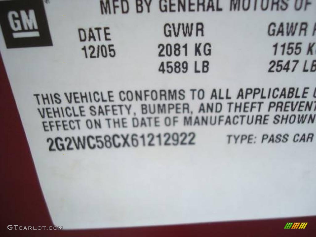 2006 Grand Prix GXP Sedan - Sport Red Metallic / Sand photo #19