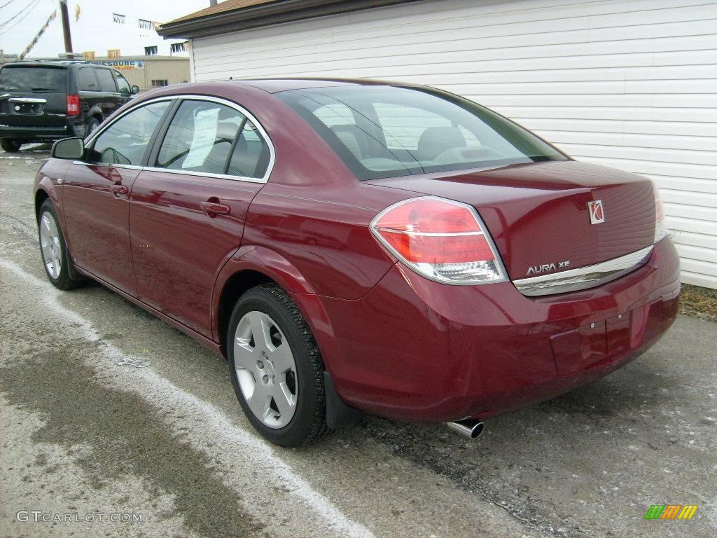 2009 Aura XE - Red Jewel Tintcoat / Gray photo #3