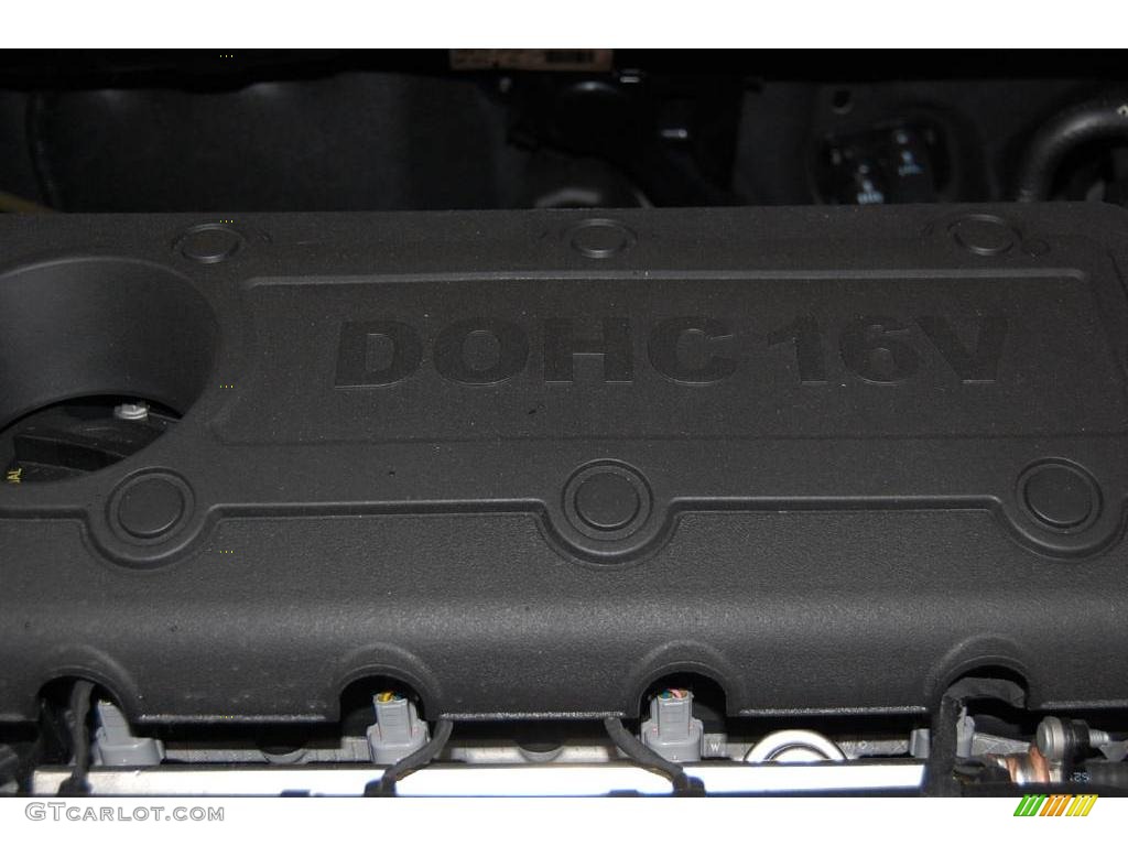 2010 Forte LX - Ebony Black / Stone photo #23