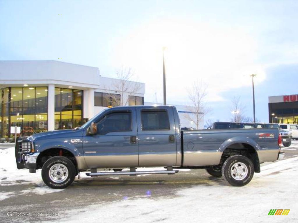2004 F350 Super Duty Lariat Crew Cab 4x4 - Medium Wedgewood Blue Metallic / Medium Parchment photo #1