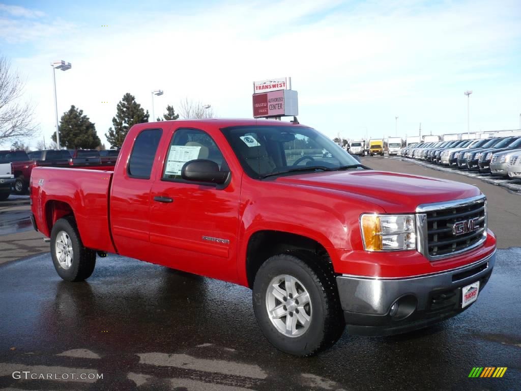 2009 Sierra 1500 SLE Extended Cab 4x4 - Fire Red / Light Cashmere photo #1