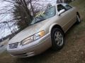 1999 Cashmere Beige Metallic Toyota Camry LE V6  photo #1