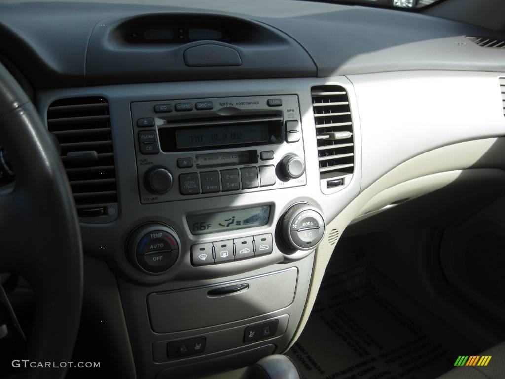 2006 Optima LX V6 - Black / Beige photo #11