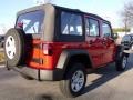 2010 Flame Red Jeep Wrangler Unlimited Sport 4x4  photo #3