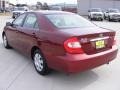 2004 Salsa Red Pearl Toyota Camry LE  photo #5