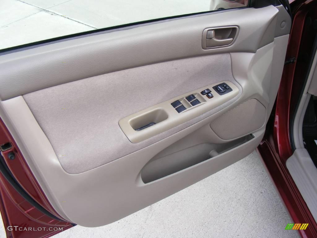 2004 Camry LE - Salsa Red Pearl / Taupe photo #32