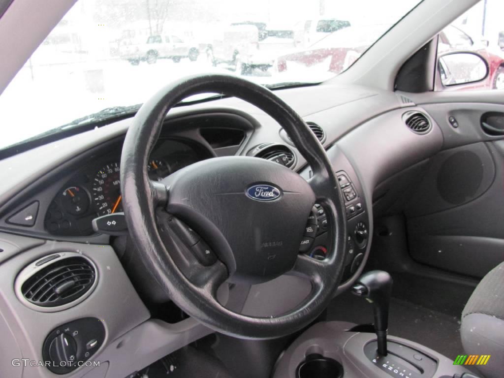 2004 Focus SE Sedan - French Blue Metallic / Medium Graphite photo #8