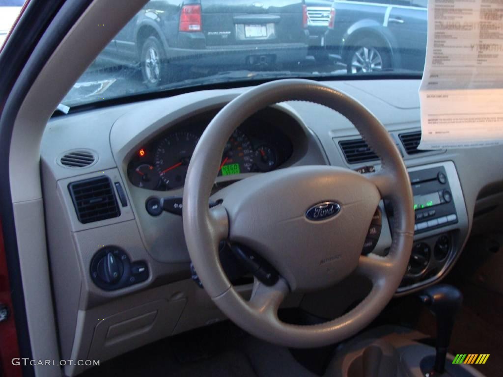 2005 Focus ZX4 SES Sedan - Sangria Red Metallic / Dark Pebble/Light Pebble photo #16