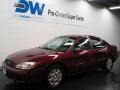 2004 Merlot Metallic Ford Taurus LX Sedan  photo #2