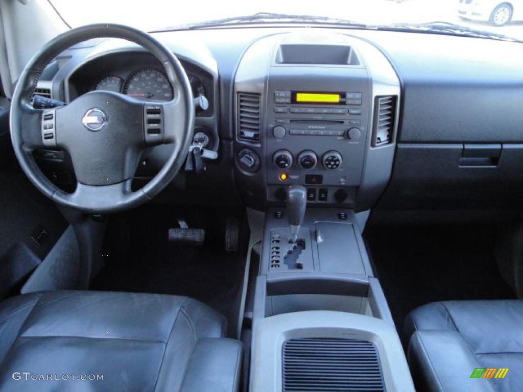 2004 Titan LE Crew Cab 4x4 - Galaxy Black / Graphite/Titanium photo #22