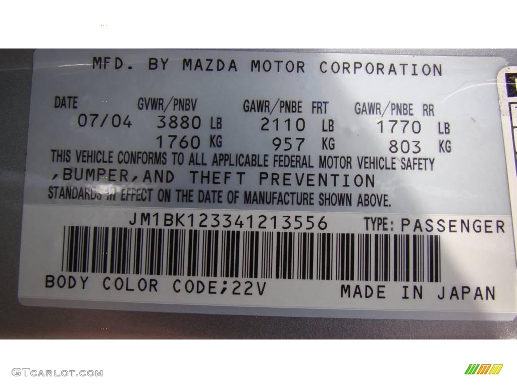 2004 MAZDA3 s Sedan - Sunlight Silver Mica / Black/Red photo #25