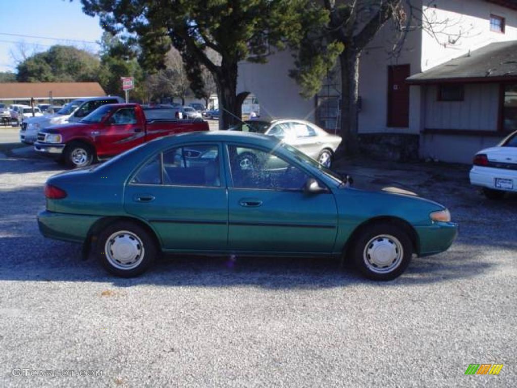1997 Escort Sedan - Pacific Green Metallic / Gray photo #4
